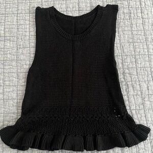 Black Knit Sleeveless Ruffle Hem Top